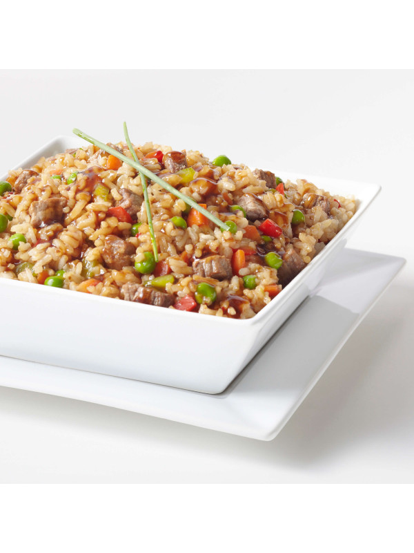 A white plate with Augason Farms Brown Rice 24lb 4 Gallon Pail - 262 Servings - (SHIPS IN 1-2 WEEKS) and vegetables on it.
