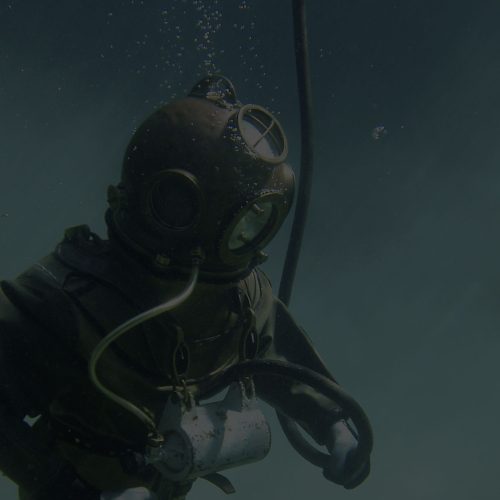 A man in a diving suit.