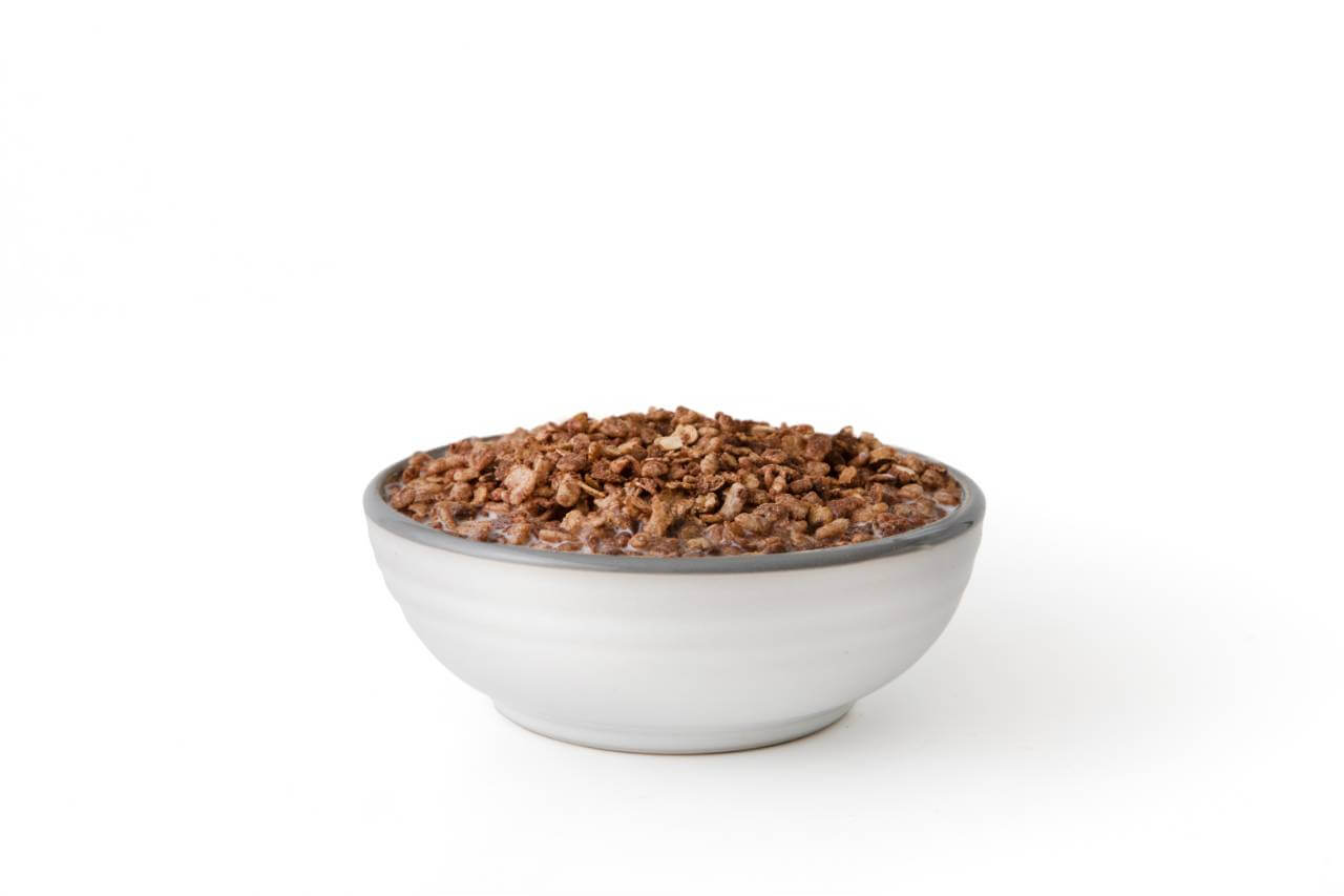 A bowl of Nutrient Survival Chocolate Grain Crunch Cereal 12 Servings on a white background.