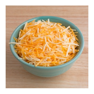 Augason Farms Freeze-Dried Shredded Colby Cheese #10 Can 107 Servings - (SHIPS IN 1-2 WEEKS) in a bowl on top of a wooden table.