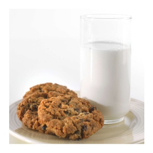 A plate of oatmeal cookies and a *Augason Farms Morning Moo's Low Fat Milk Alternative 93 Servings - (SHIPS IN 1-2 WEEKS).