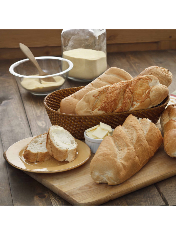 *Augason Farms Honey White Bread, Scone and Roll Mix 49 Servings - (SHIPS IN 1-2 WEEKS) and butter on a wooden cutting board.