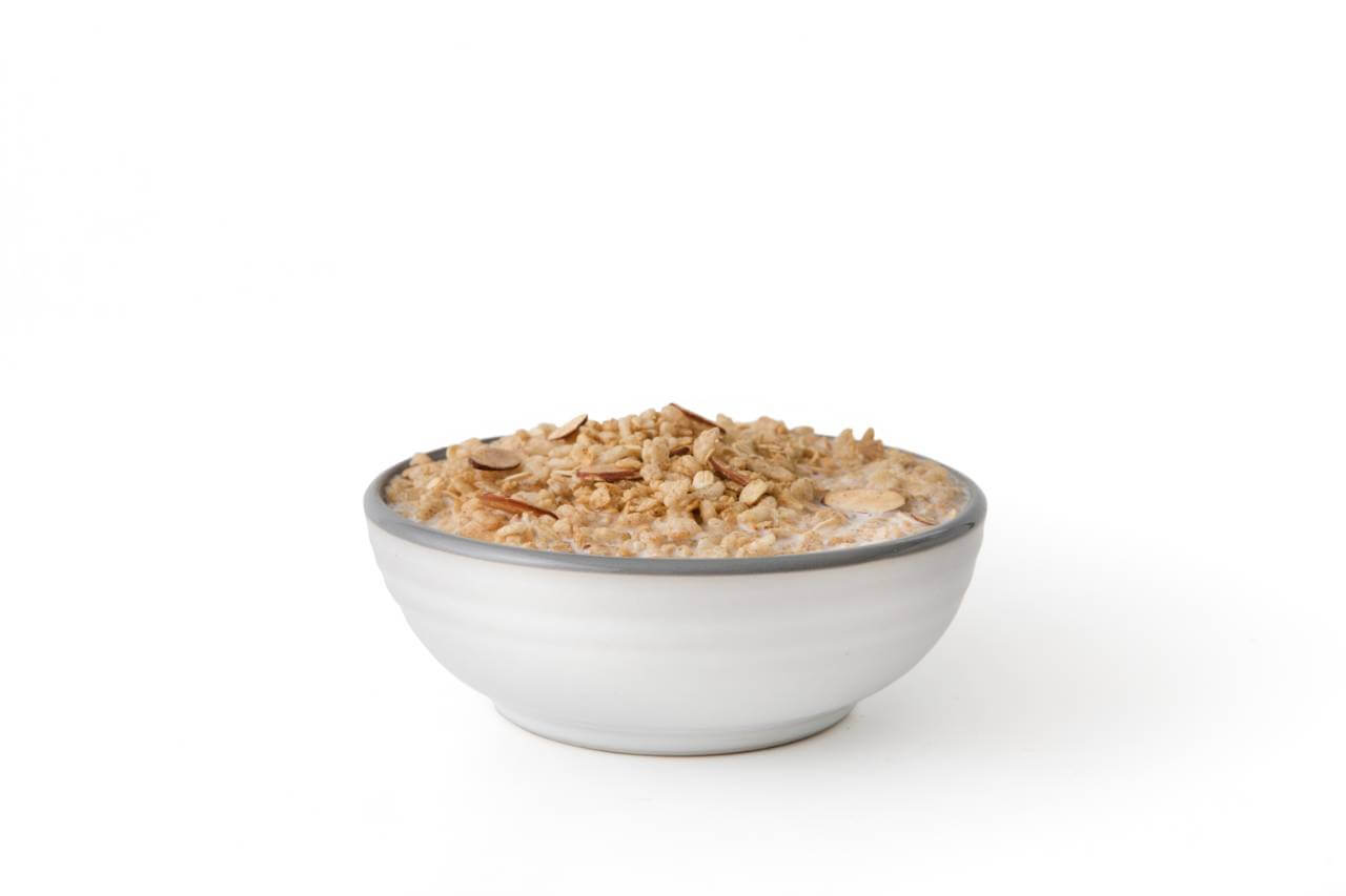 A bowl with Nutrient Survival Maple Almond Grain Crunch Cereal 12 servings - (SHIPS IN 2-4 WEEKS) in it on a white background.