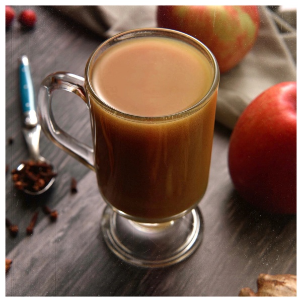 A revitalizing apple cider beverage infused with cinnamon sticks and apples, packed with essential nutrients for survival.