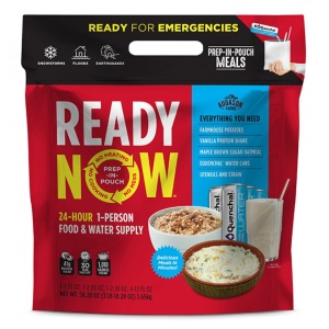 A bag of Augason Farms READY 24-Hour 1-Person Emergency Food Supply READY NOW (Farmhouse Potatoes) in front of a person.