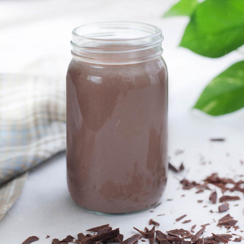 Nutrient Survival Non-GMO Vegetarian Gluten-Free Creamy Chocolate Shake SINGLES in a mason jar.
