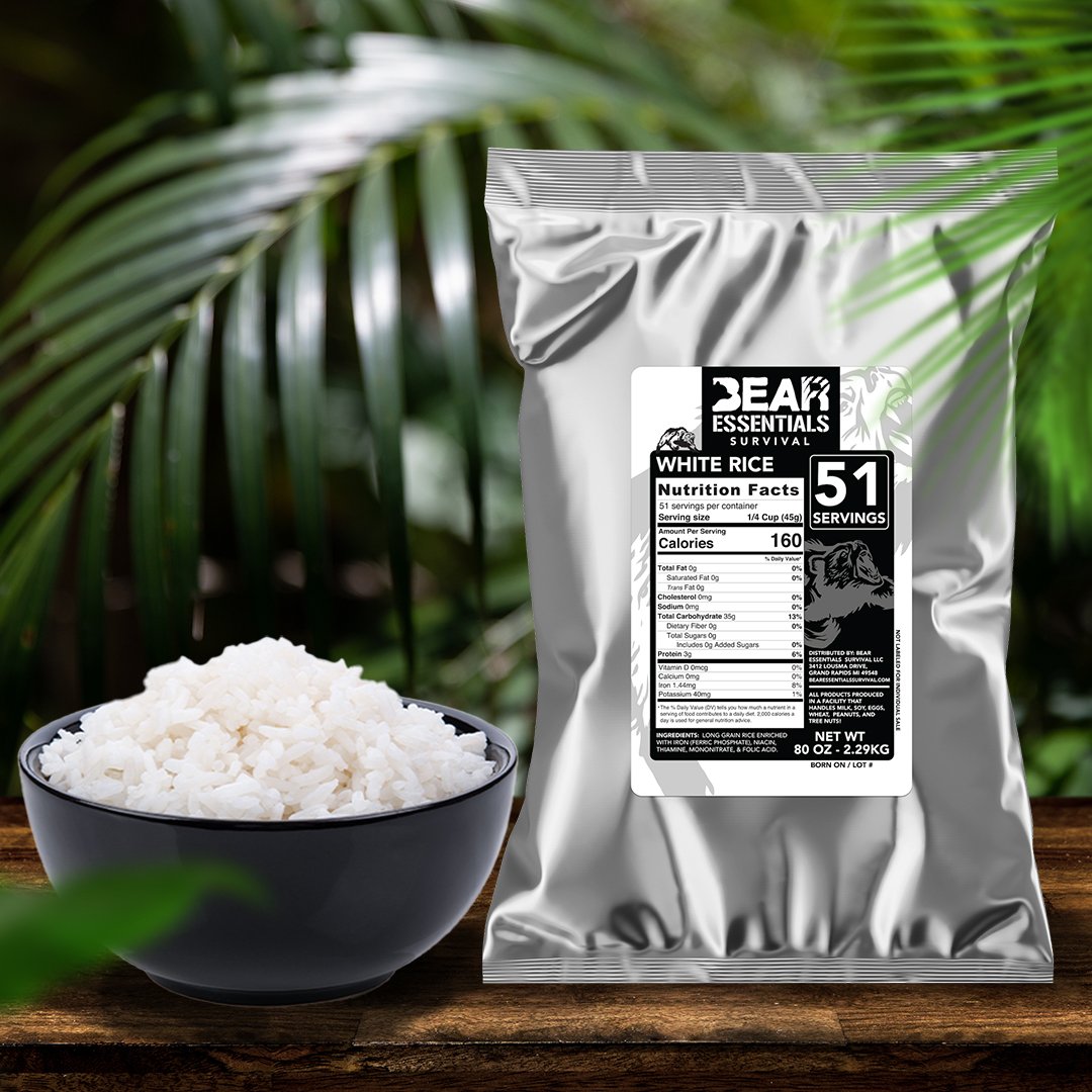 A bowl of rice next to a Bear Essentials Survival 15 Day Emergency Food Supply Box - 189 Servings - (SHIPS IN 1-4 WEEKS).