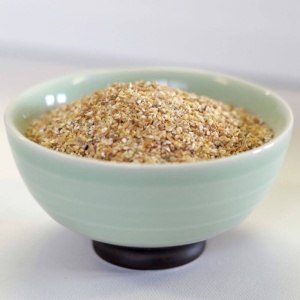 A bowl of granola for emergency food storage in a white bowl.