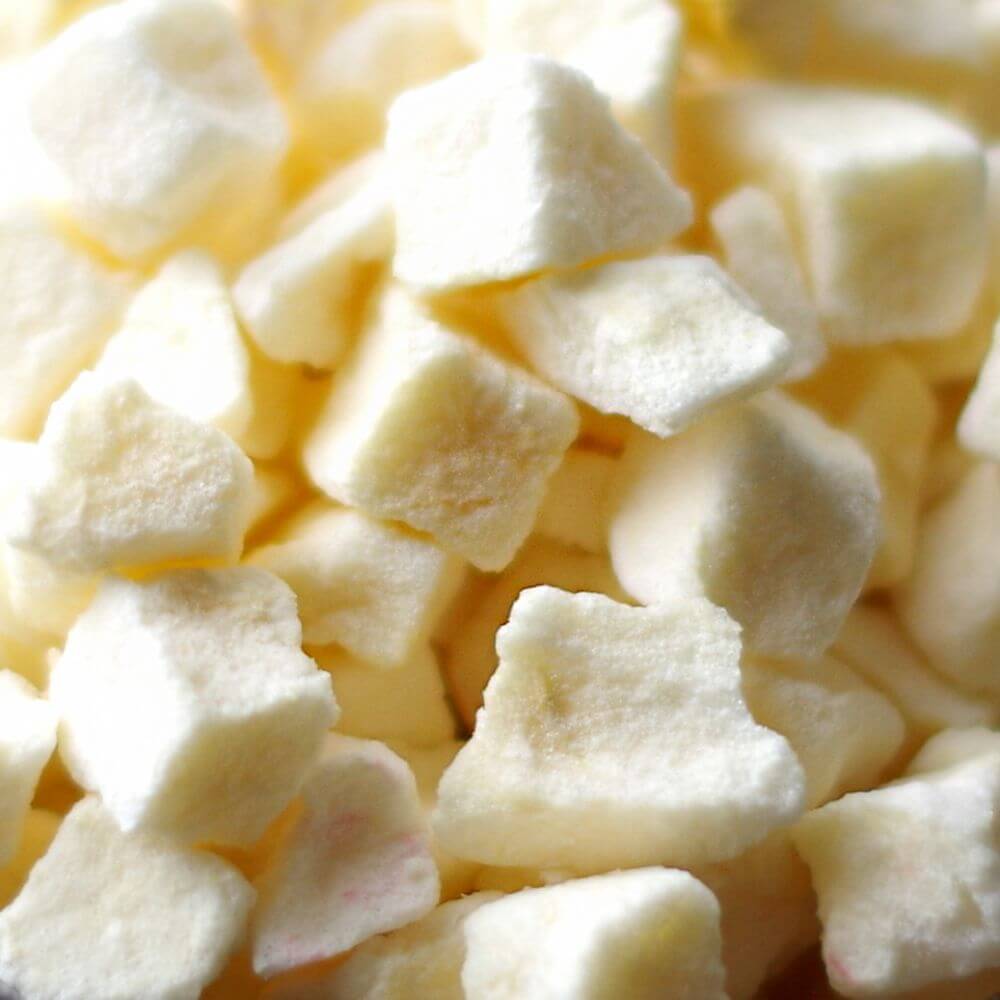 A pile of white cubes in a bowl.