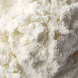 A close up of a bowl of white powder.