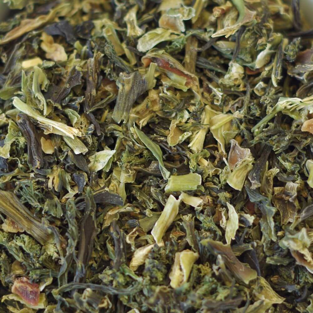 A close up of a pile of green tea.