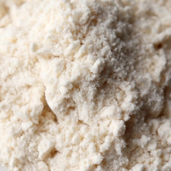 A close up of a bowl of white flour.