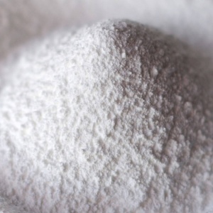 A close up of white powder in a bowl.