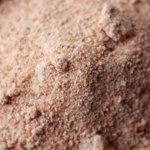 A close up of a bowl of seasoned salt.