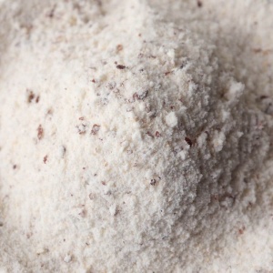 A close up of a bowl of flour.