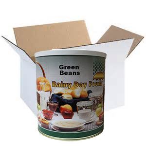A tin of green beans in a box.