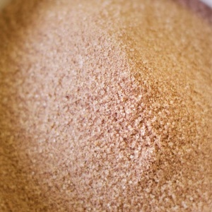A close up of brown sugar in a bowl.