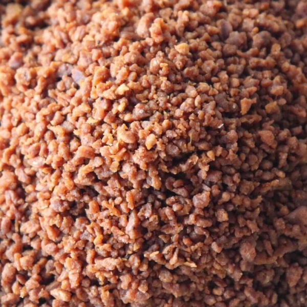 A close up of a bowl of brown rice.