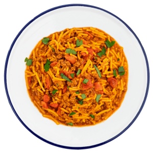A white plate with a Mountain House Spaghetti with Meat Sauce Mylar Pouch - 2 Servings - (SHIPS IN 1-2 WEEKS) of chili and noodles.