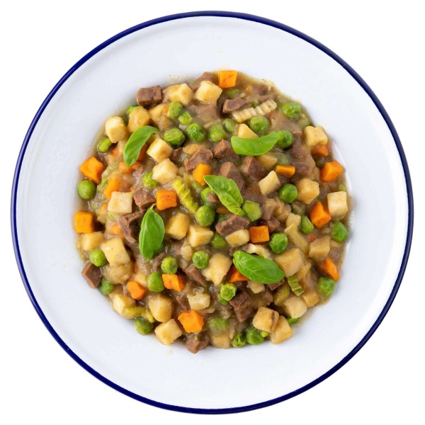 A plate with Mountain House Beef Stew Pouch - Gluten-Free - 2 Servings - (SHIPS IN 1-2 WEEKS), vegetables, and peas on a white background.