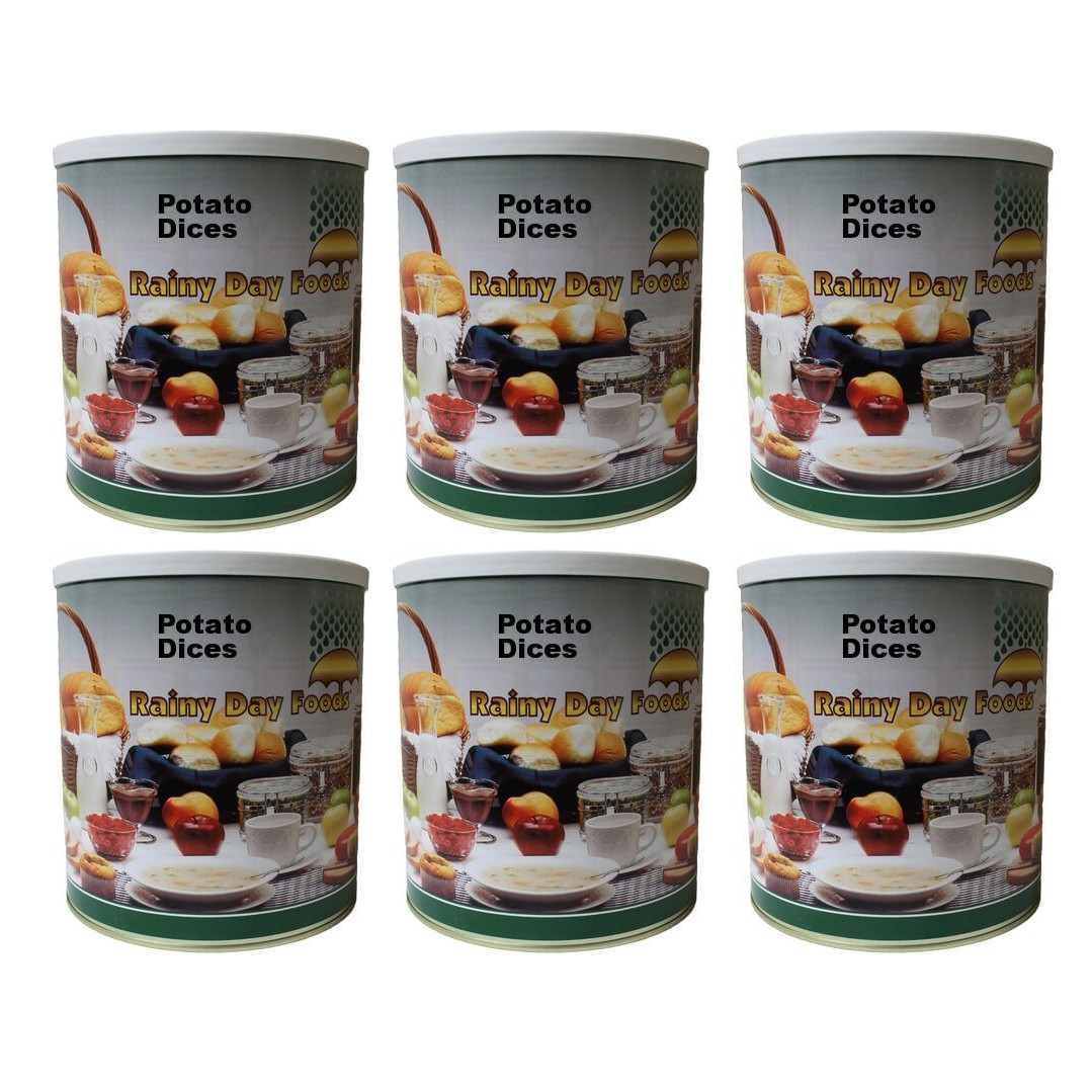 Six tins of Rainy Day Foods potato dices on a white background.
