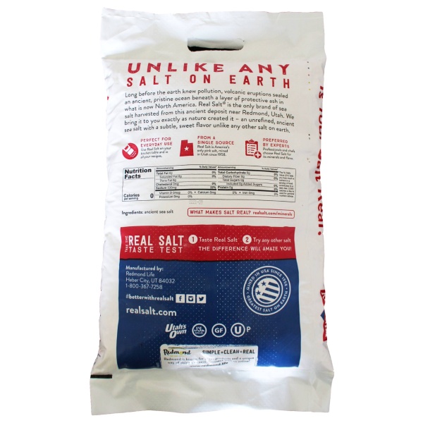 A Rainy Day Foods Gluten-Free Non-GMO Real Salt 25 lbs Bag - 8099 Servings - (SHIPS IN 5-10 WEEKS) with a red, white and blue label on it.