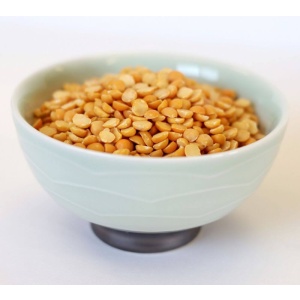Fenugreek seeds for emergency food storage in a bowl on a white surface.