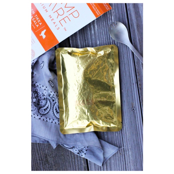 A gold foil packet with a spoon and book - 18-Pack Case - (SHIPS IN 1-3 WEEKS).