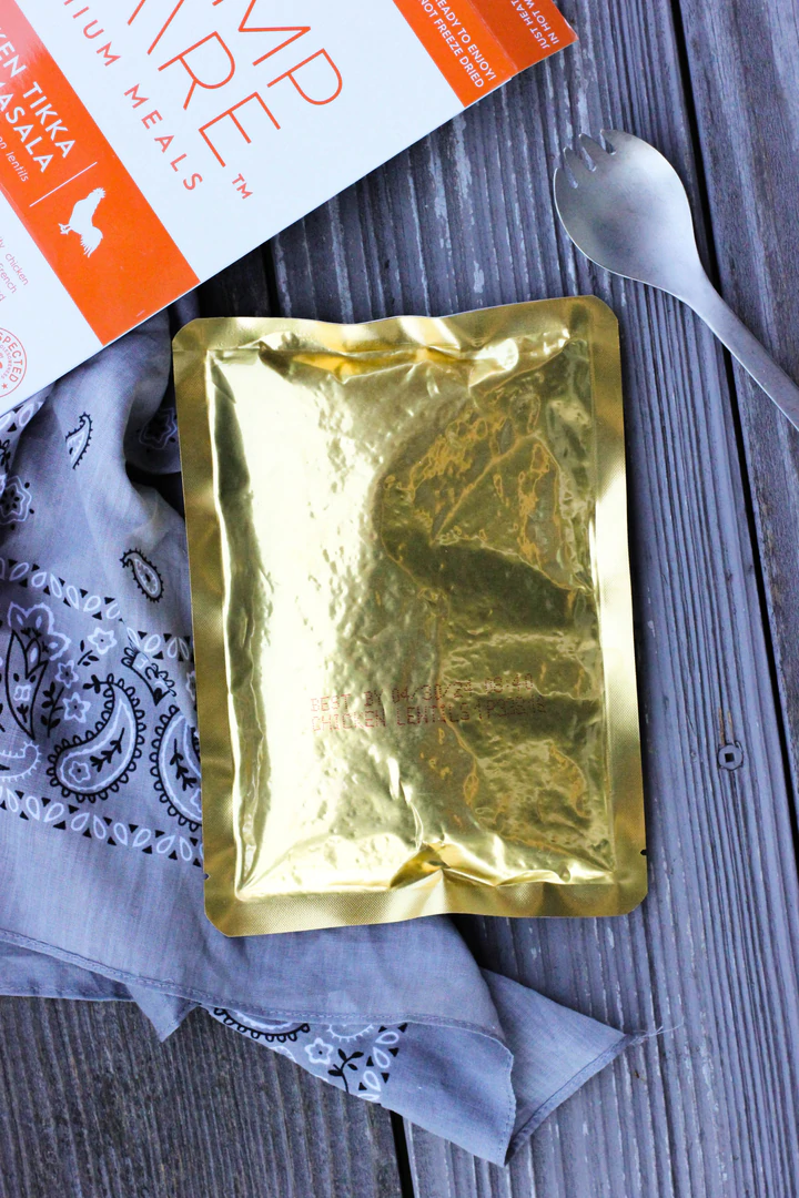 A gold foil packet with a spoon and book - 18-Pack Case - (SHIPS IN 1-3 WEEKS).