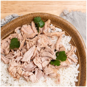 A bowl of rice with shredded pork on top, ideal for emergency food storage.
