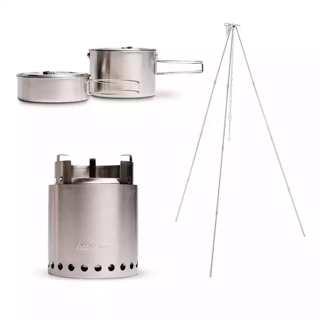 Stainless steel camp stove and pots displayed on a white background.
