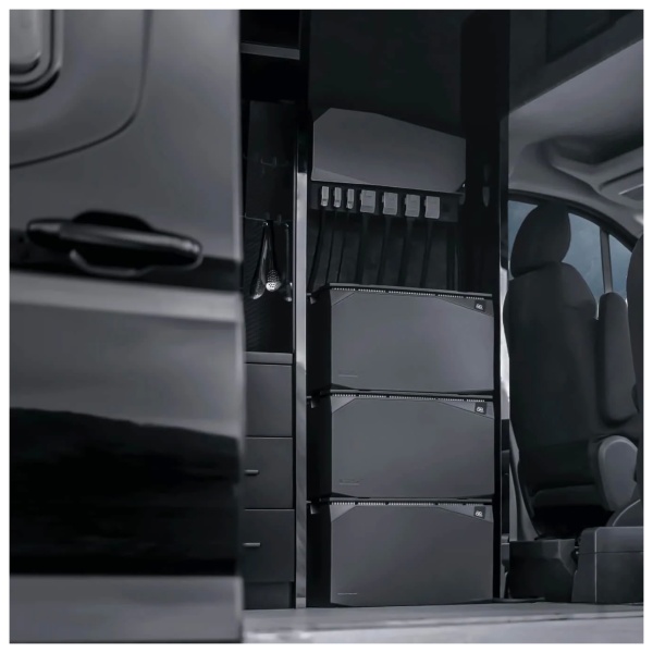 A black van with ample storage space, equipped with the EcoFlow 5kWh Power Kits - Independence Kit.