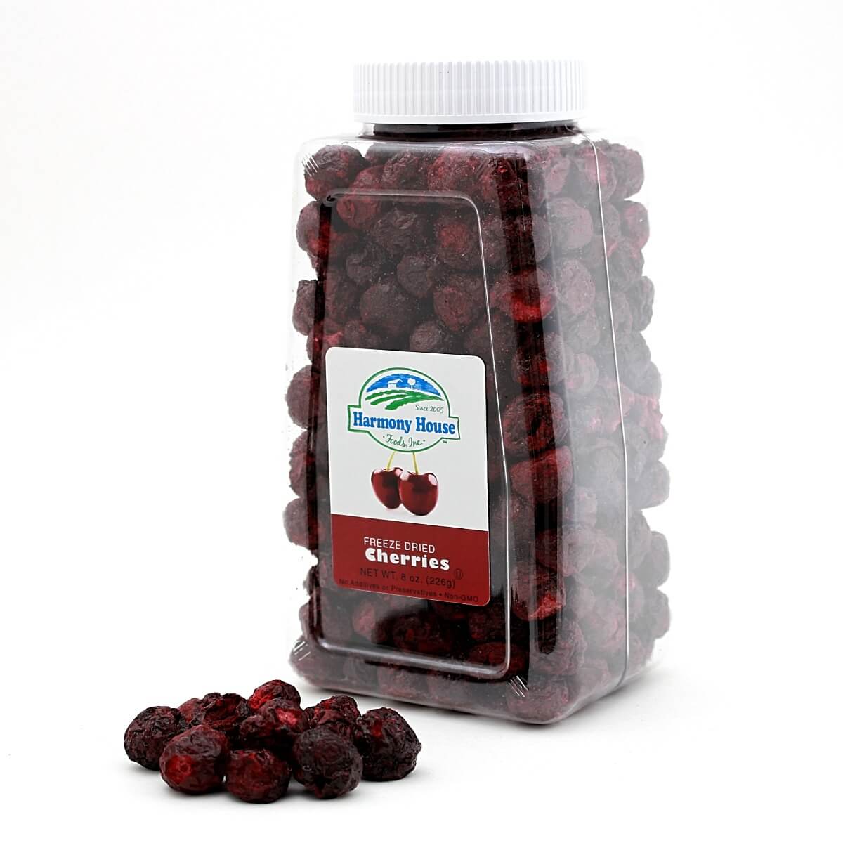 Cranberries in a jar on a white background, Harmony House freeze dried cherries.