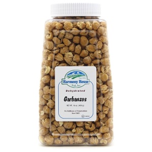 A plastic container of Harmony House Garbanzo Beans.