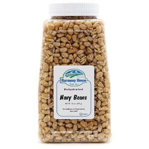 A jar of Harmony House Navy Beans on a white background.