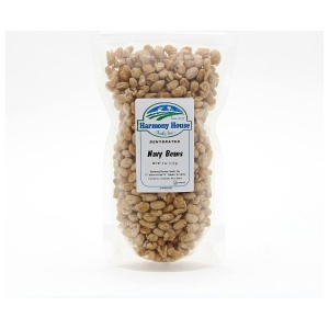 Navy beans in a bag on a white background.