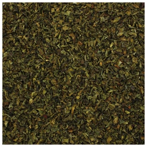 A close up of a pile of green tea leaves.