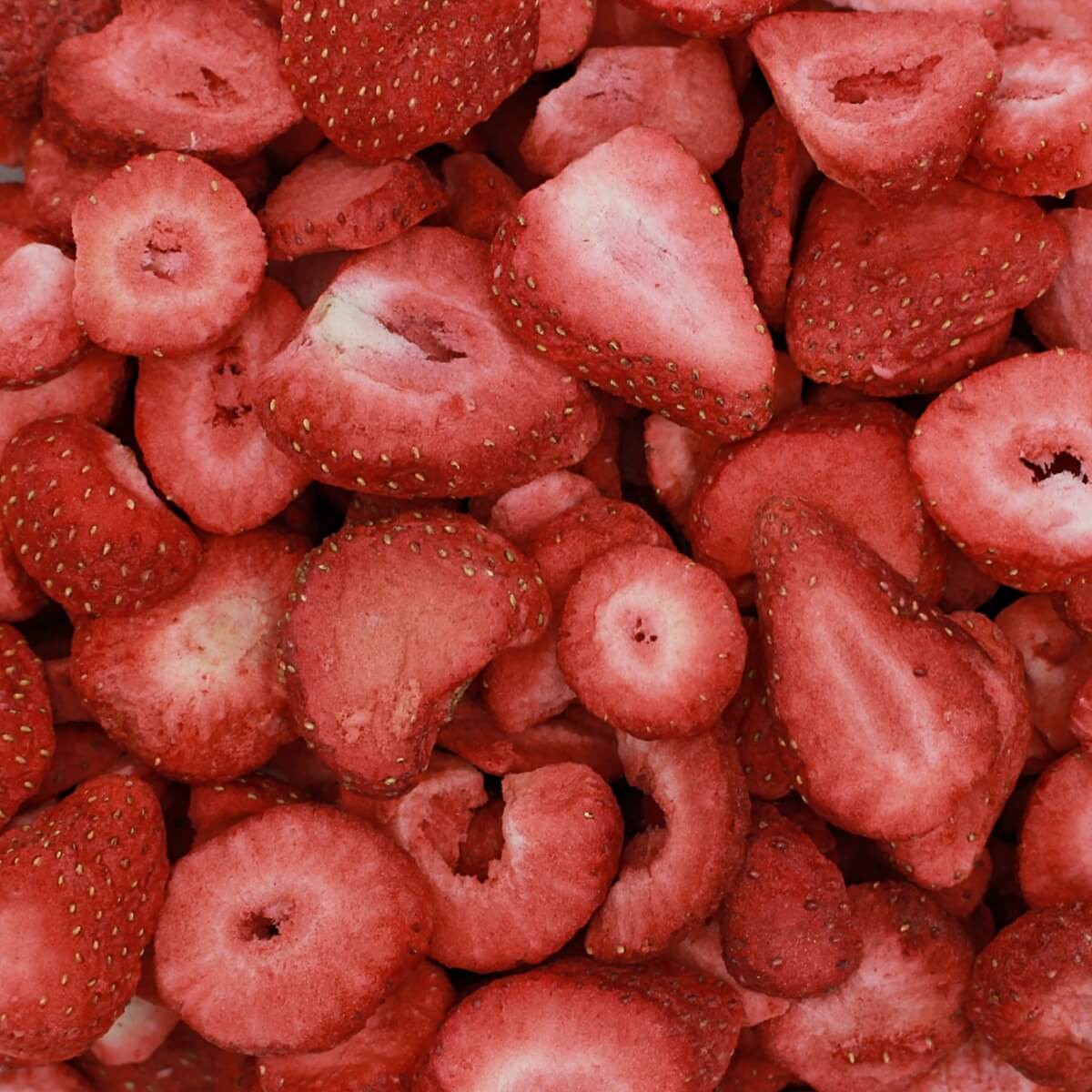 A close up image of freeze-dried strawberries.