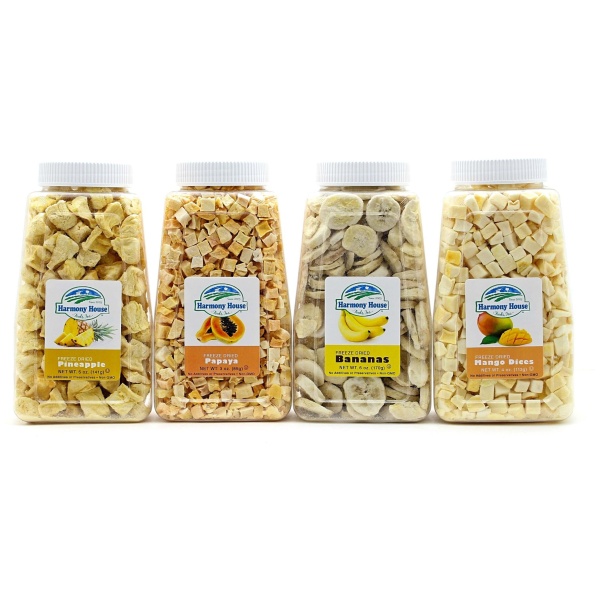 Four jars of fruit and nut snacks are lined up on a white background, Harmony House Tropical Fruit Medley (4 Jars).