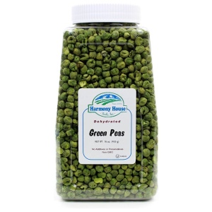 A jar of green peas on a white background, Harmony House Dried Sweet Peas.