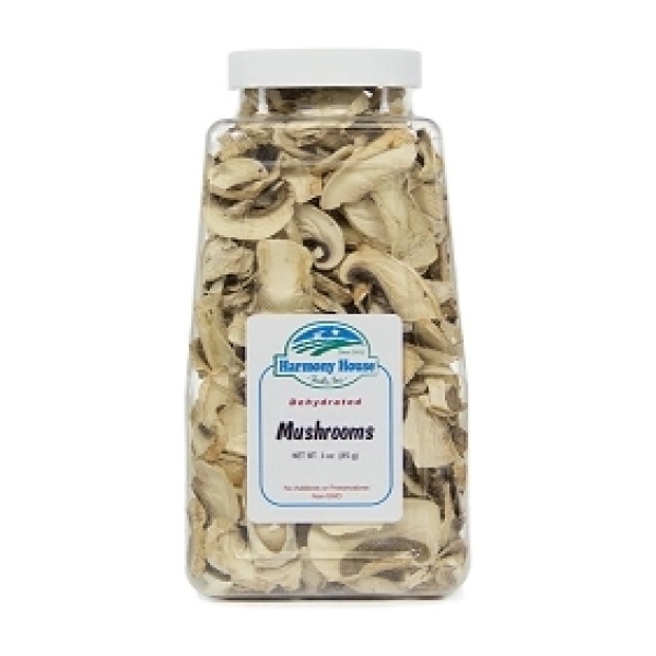 A jar of sliced mushrooms on a white background.