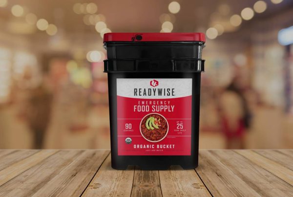 A red container with a red lid, certified organic food storage.