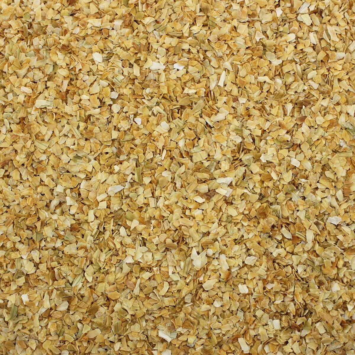 A close up image of a pile of brown granules from the Harmony House Organic Vegetable Pantry Stuffer.