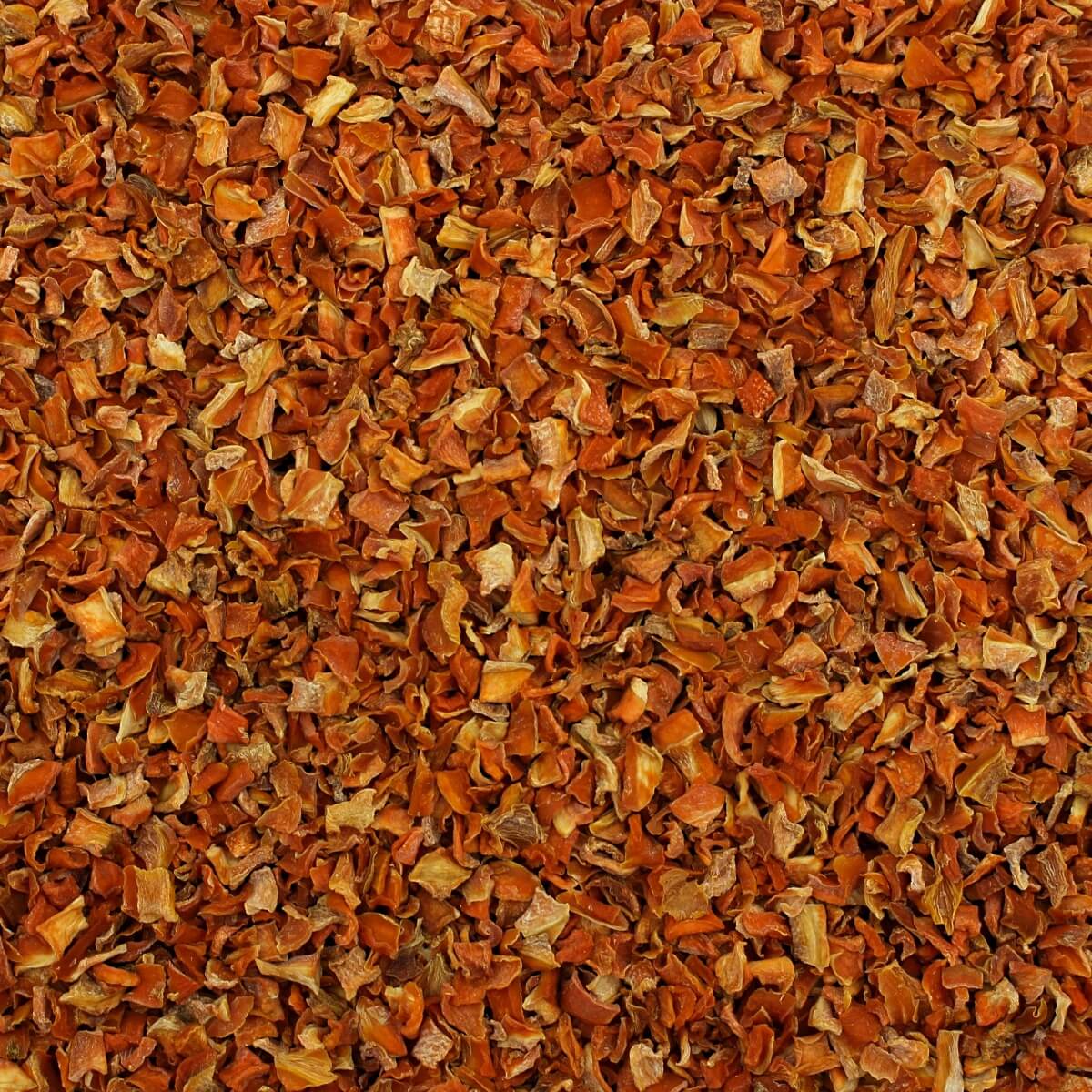 A close up image of a pile of dried red peppers available in Harmony House Organic Vegetable Pantry Stuffer.