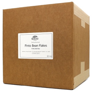 A brown box with a brown label on it containing Harmony House Pinto Bean Flakes (18 lbs).