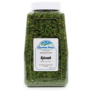 Harmony House Dried Spinach Flakes jar on a white background.