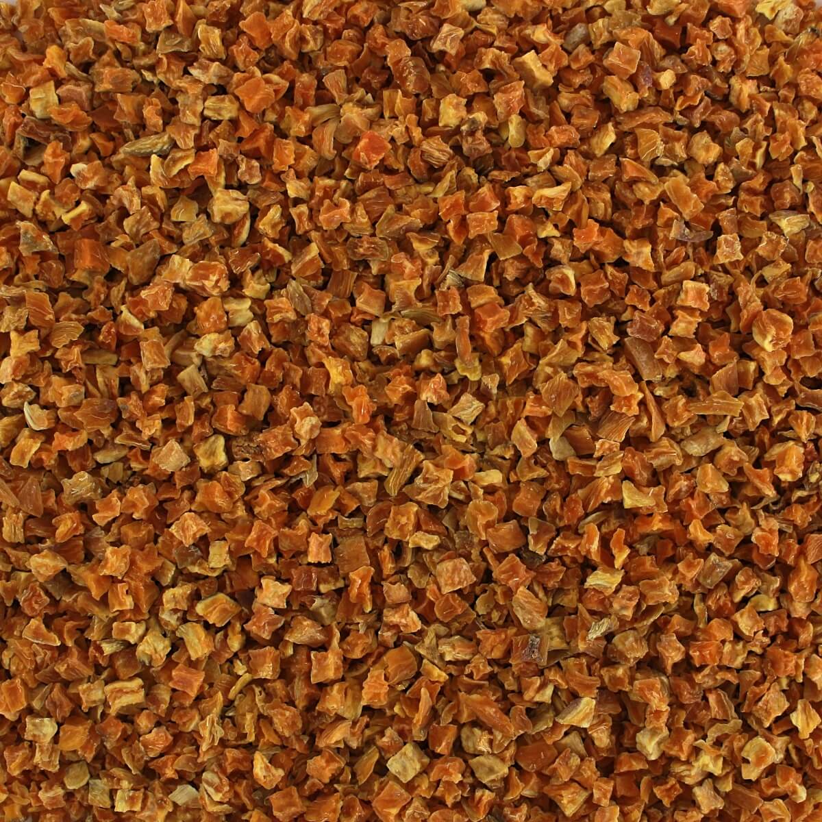 A close up image of a pile of dried oranges.