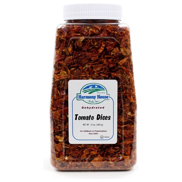 A jar of tamales on a white background with Harmony House Dried Tomato Dices (8 oz) - (SHIPS IN 1-2 WEEKS).