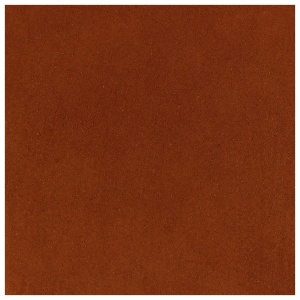A close up image of a brown background with Harmony House Tomato Powder.