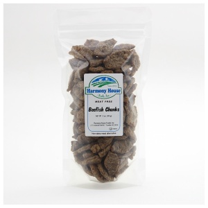 A bag of dog treats on a white background with Harmony House Beef Style Chunks.